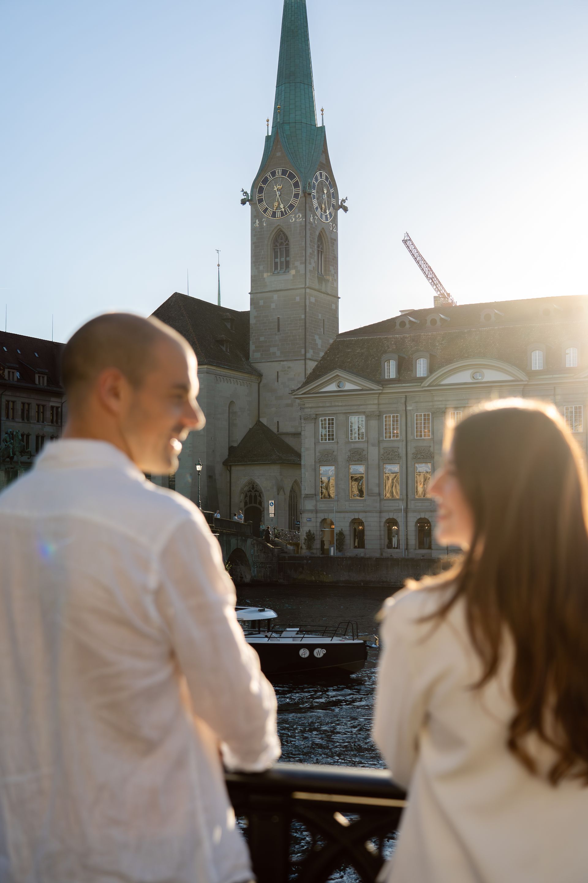 A couple facing each other during a sunset shoot in Zürich
