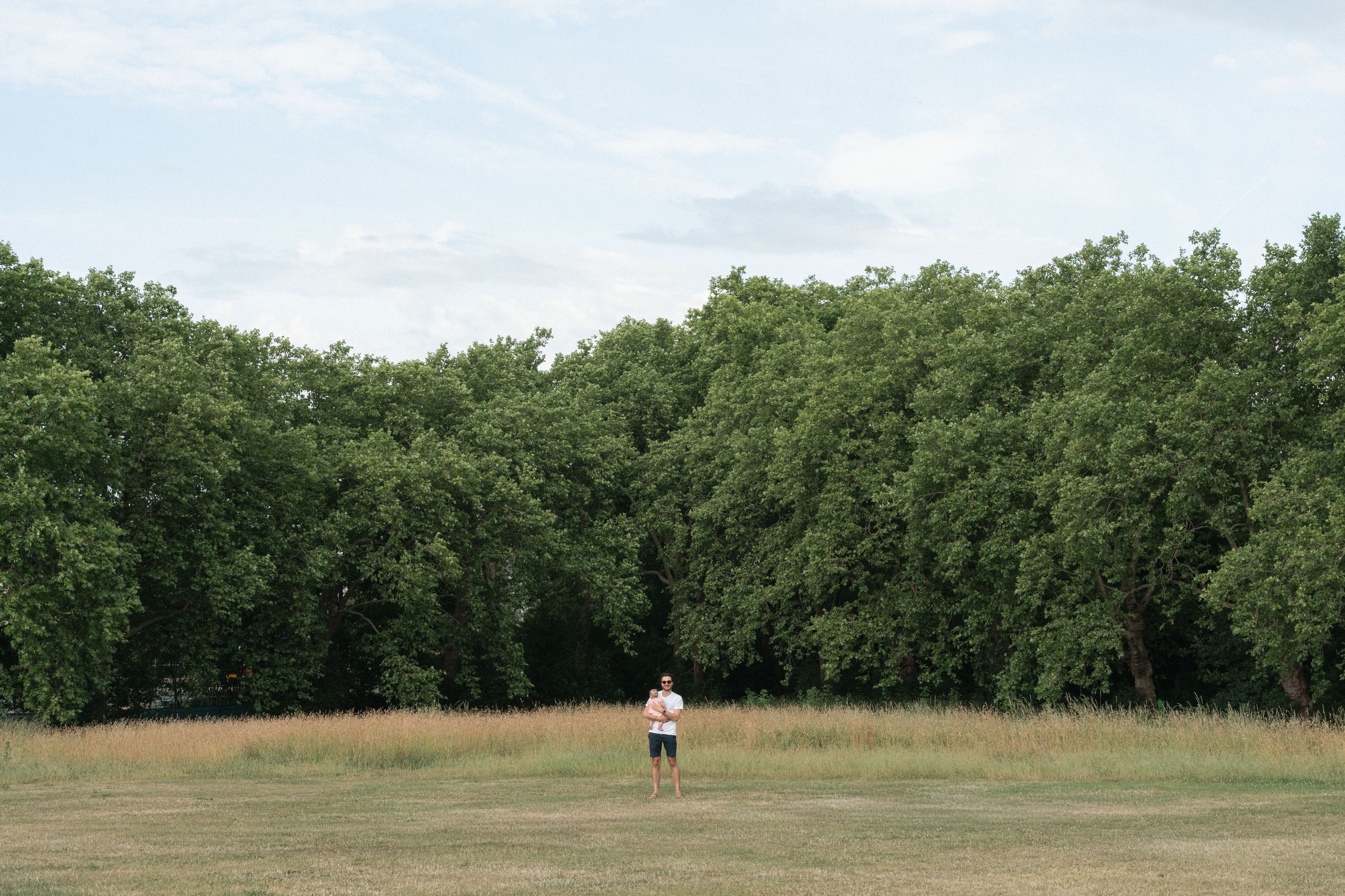 Father and daughter during a family photography session in Primrose Hill, London